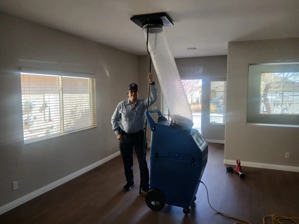 Professional Dryer Vent Cleaning work inside a Kaser home